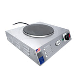 A silver, portable hot plate with a single cast iron burner, black heating surface, control knob, power indicator light, and side vents. Features Cadco branding, a power cord, and an American flag sticker on the front corner.