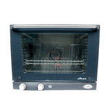 A black and stainless steel half size countertop convection oven with a glass door, two control knobs, a blue power indicator light, two metal racks inside, and the brand names Cadco and Aura visible on the front panel.
