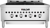 A stainless steel Vulcan gas countertop range with four control knobs, black grates on top, ventilation holes along the front, and sturdy metal legs. The Vulcan logo is centered above the knobs—perfect for charbroiler-style cooking.