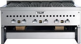 A stainless steel commercial grill with six black and silver control knobs, labeled “Vulcan,” features a metal grate on top and an open Wood Assist Smoker Base below containing two pieces of wood for convenient smoking.