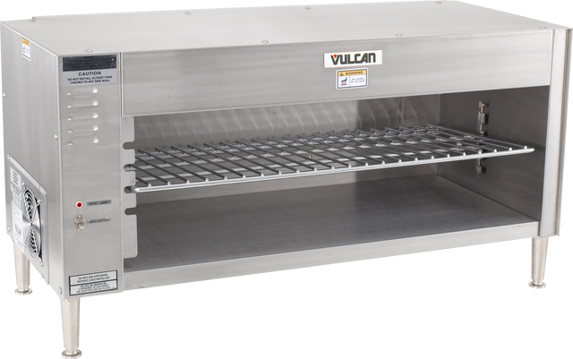 A commercial stainless steel Vulcan broiler with a quartz infrared heating element, wire cooking rack, open front, vent slots, side control panel, caution and brand labels, and sturdy legs—designed for professional kitchen use.