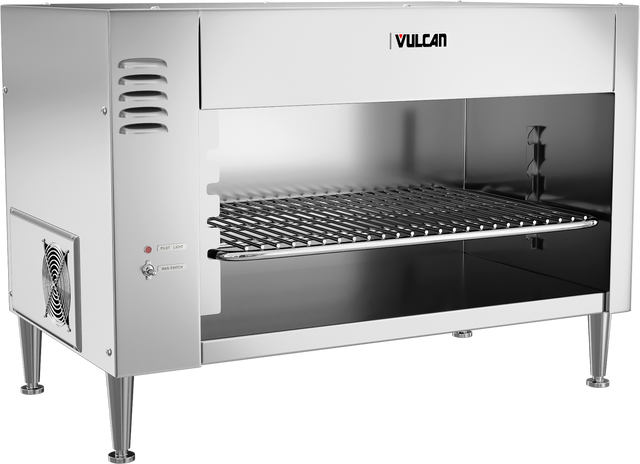 A commercial stainless steel salamander broiler with the brand name Vulcan on the top right. Featuring quartz infrared heating, it has an open front, a grilling rack inside, vent slits on the side, a control knob, power switch, and stands on four metal legs.