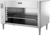 A stainless steel Cheesemelter broiler oven with an open front, metal rack, four sturdy legs, vent slots on the left, and the brand name Vulcan centered at the top. This sleek appliance features an industrial design and quartz infrared heating.