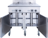 A commercial V-Series Multifunction Cooker with stainless steel construction features two covered burners, front control knobs, open double doors revealing vertical gas pipes, and four caster wheels, all in a clean, industrial design.
