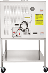 A large stainless steel Combi oven steamer on wheels with a vented back panel, caution labels, a coiled black power cord, switches, and a lower open shelf for storage. The machine is rectangular and boilerless in design with an industrial appearance.