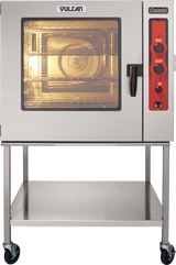A commercial stainless steel Vulcan boilerless Combi oven steamer on wheels, with a glass door showing interior racks and a lit interior. The right side features a red control panel with dials and digital display. An open shelf is below the oven.