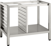 Stainless steel Deluxe Stand open-frame kitchen rack with a rectangular shape, featuring multiple horizontal slots on one side for tray or pan supports, a flat bottom shelf, and sturdy square legs with black feet. The top and front are open, showing the interior structure.