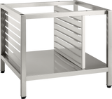 A stainless steel Deluxe Stand with a solid bottom shelf, four legs, and perforated side panels featuring horizontal slots. The open-frame top accommodates pan supports, giving it a sleek, industrial look ideal for kitchen or commercial use.