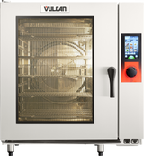 A commercial Vulcan TCM-102E combi oven with a glass door shows metal racks inside. The oven features a digital touchscreen control panel with various icons, a large red dial on the right, and an industrial metallic exterior.