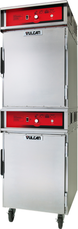 A commercial stainless steel Vulcan double-deck Cook/Hold Cabinet with two stacked compartments, red control panels, black handles, and caster wheels for mobility—ideal for keeping food warm in professional kitchens.