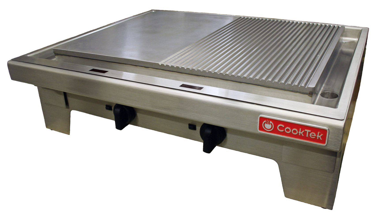 A stainless steel countertop cooking equipment griddle features a chrome half-grooved cooking surface, with a smooth flat top on the left and grooved grill on the right, two black control knobs, and a red CookTek logo on the front panel.