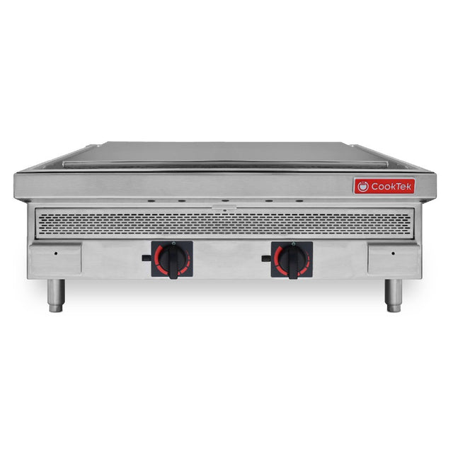 A stainless steel CookTek induction plancha griddle with two red and black control knobs, ventilation slots above the knobs, and four sturdy legs. Its flat, smooth surface makes it ideal countertop cooking equipment for restaurants or kitchens.