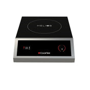 A black and silver CookTek Helios Induction Cooktop with stainless steel housing features a digital control panel, round HELIOS-marked surface, temperature icons on the left, and a red power dial on the right; set against a white background.