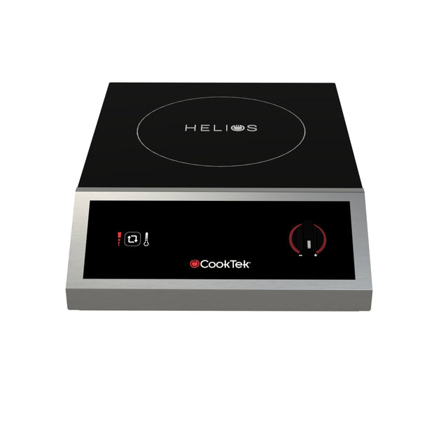 A black and silver CookTek Helios Induction Cooktop with stainless steel housing features a digital control panel, round HELIOS-marked surface, temperature icons on the left, and a red power dial on the right; set against a white background.