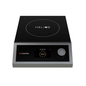 A black and silver portable induction cooktop features a circular cooking area labeled “HELIOS.” Its countertop design includes a digital display showing “275°F,” a single rotary knob, and a red “CookTek” logo on the control panel.