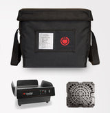 A black insulated food delivery bag with a shoulder strap, clear label pocket, and red hot food icon is shown above two devices: an induction charger-powered portable heating unit and a black vented plastic tray from the ThermaCube Delivery System.