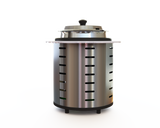A stainless steel soup tureen with vertical slits stands upright on four short legs. A shiny metal lid with a black knob sits loosely on top. The plain white background makes the tureen the focal point.