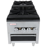 A commercial Empura stainless steel natural gas stock pot range with four black cast iron burners, silver control knobs, and the Empura logo on the front. It features a rectangular design, short metal legs, and a lower oven or storage section.