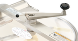A close-up of a Hobart Cutter Mixer shows its manual crank handle with a black knob, attached to the transparent lid above the stainless steel bowl. Caution labels and an instructional diagram are visible, highlighting its 45 qt capacity.