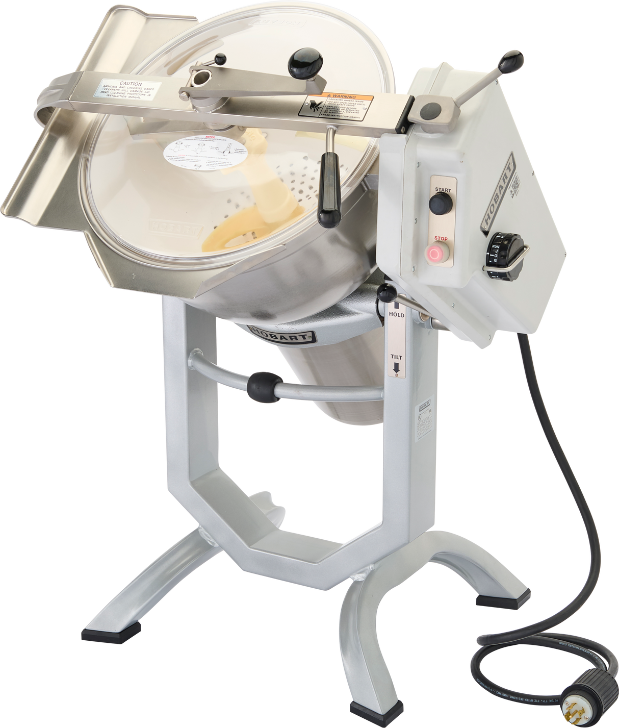 A large Hobart Cutter Mixer food processor with a tilted metal base, stainless steel bowl, transparent lid, control panel with knobs and buttons, and a black power cord. This 45 qt capacity machine is silver and built for commercial kitchen use.