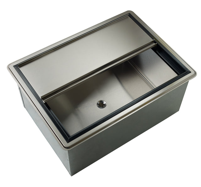 A modern, rectangular stainless steel ice bin with a sliding lid partially open, revealing an inner compartment and central drain. The drop-in ice bin features a smooth metallic finish and is framed by a black rubber seal around the top edge.