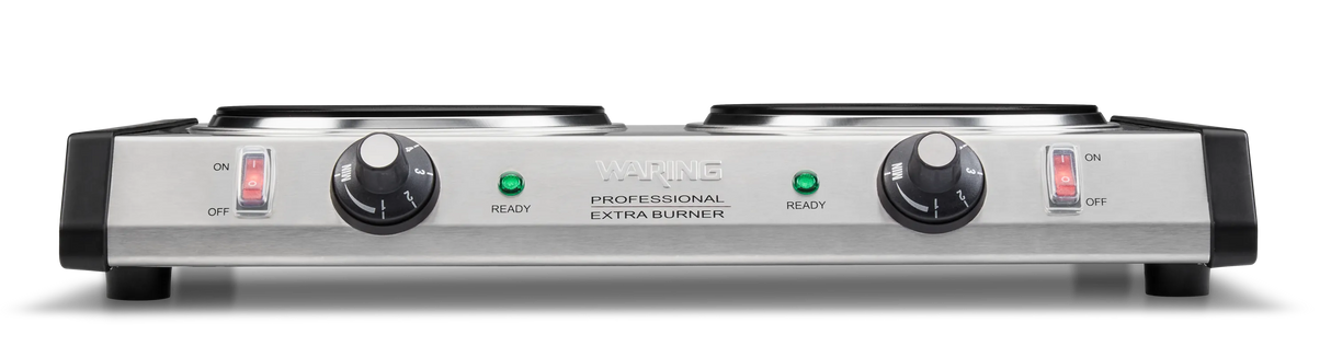 A stainless steel Waring Professional Double Burner with cast iron burner plates, dual power knobs, labeled “READY” lights above each knob, and red ON/OFF switches with indicators on both sides. The brand name is centered on the front panel.