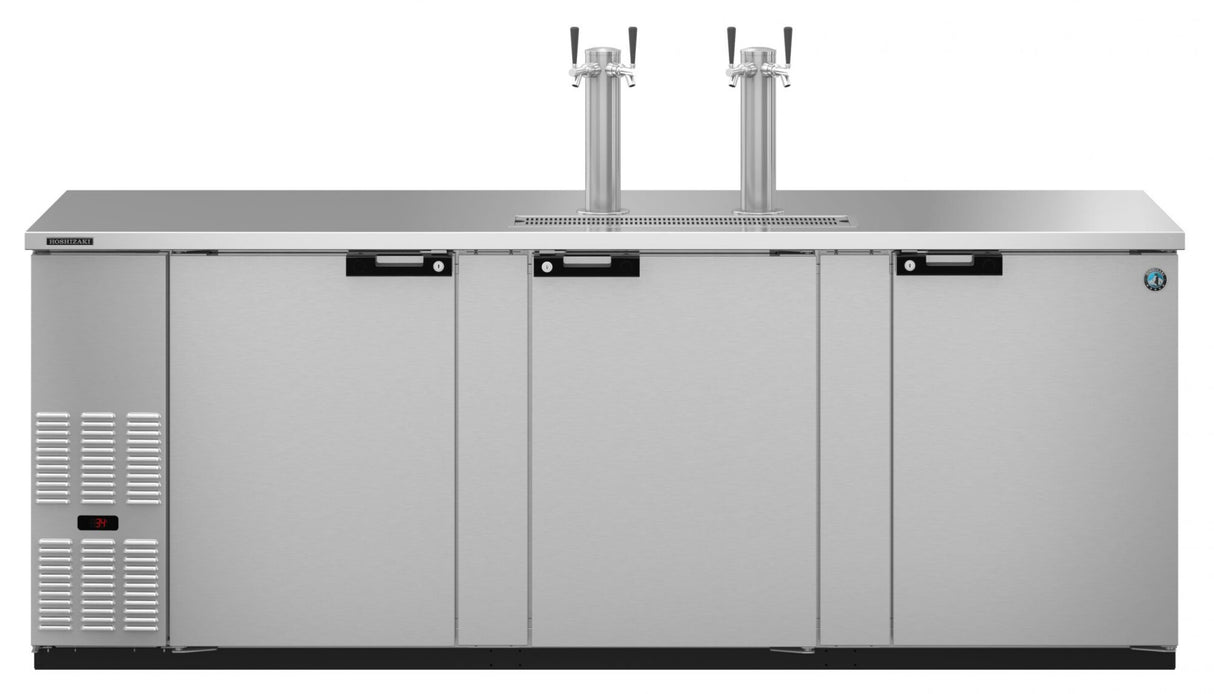 A stainless steel, three-section Draft Beer Cooler with self-contained refrigeration features three doors and two beer taps on top. The control panel and vent are on the left side, giving this unit a clean, modern, industrial look for dispensing draft beverages.