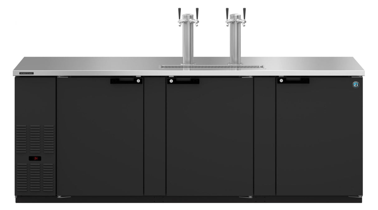 A commercial black and stainless steel three-section keg refrigerator with direct draw, featuring two tall chrome beer taps on top and a small control panel. The flat, clean surface is perfect for use as a bar or draft beer cooler.