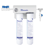 A Blueair dual filtration system mounted on a wall, featuring two vertical cylindrical filters with labels, a small pressure gauge, pipes, and a blue valve. The setup ensures scale reduction, ideal for use as an ice machine water filter.