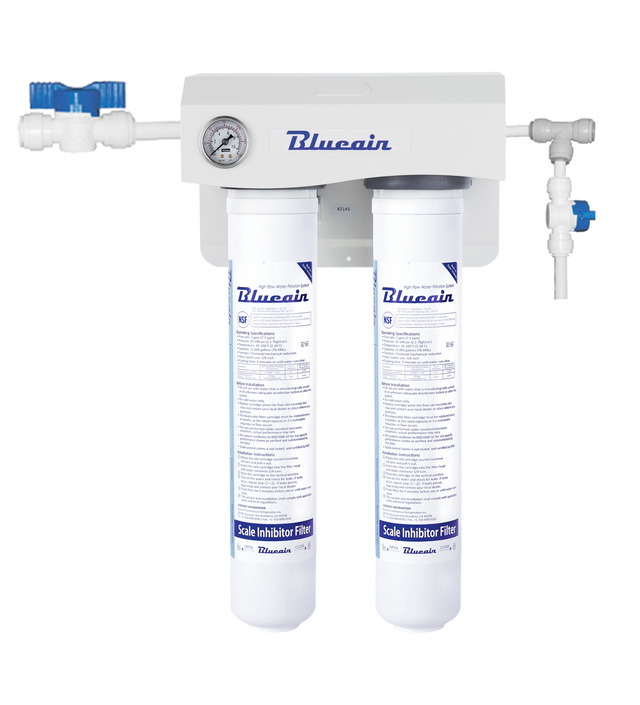 A Blueair dual filtration system mounted on a wall, featuring two vertical cylindrical filters with labels, a small pressure gauge, pipes, and a blue valve. The setup ensures scale reduction, ideal for use as an ice machine water filter.