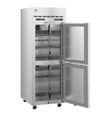 A Hoshizaki Steelheart reach-in refrigerator with two vertically stacked doors, the top door open showing empty wire shelves inside. The unit features ventilation grilles, digital control panels, and wheels for mobility.
