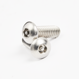 Two shiny metal screws with round heads and hexagonal socket drives are positioned on a white background. The clean, reflective screws resemble components often found in commercial dishwasher assemblies or door type dishwasher installations.