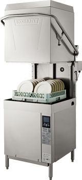 A stainless steel commercial ventless dishwashing machine with an open hood displays a rack of white plates. The front features a control panel and instruction label. Its high temp sanitizing design and Hobart logo reflect modern, industrial style.