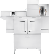 A large, industrial stainless steel oven with double glass doors stands on adjustable legs. The top section shows a cutaway revealing internal machinery, similar to a conveyor dishwasher, with control buttons on the left and a black compressor on the right.
