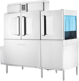 A large, industrial stainless steel conveyor dishwasher with two front doors, a control panel on top, and a power scrapper in the right-side conveyor belt section with blue flaps. The machine stands on adjustable legs and features a modern, clean design.