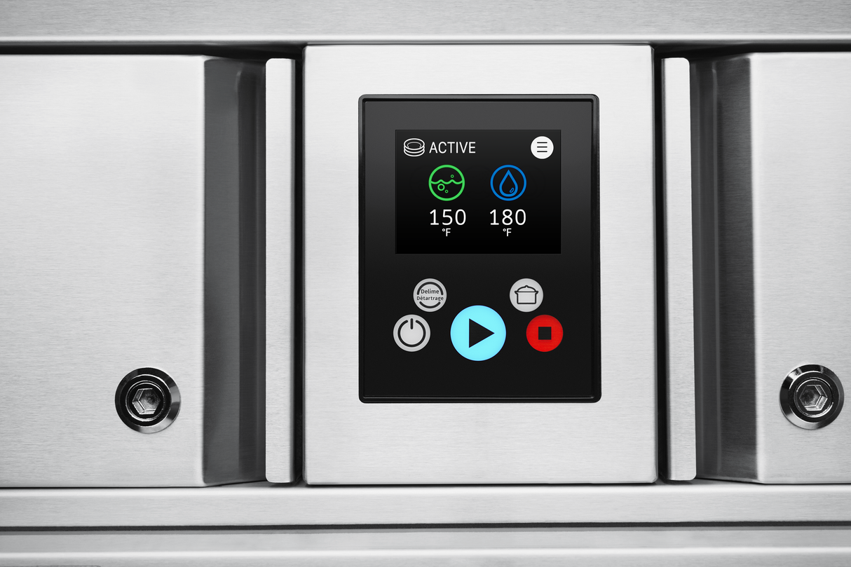 A close-up of a digital control panel on a stainless steel conveyor dishwasher displays temperature readings—150°F and 180°F—alongside icons for power, play, stop, and menu functions. The panel is centered between two metal sections with keyholes.