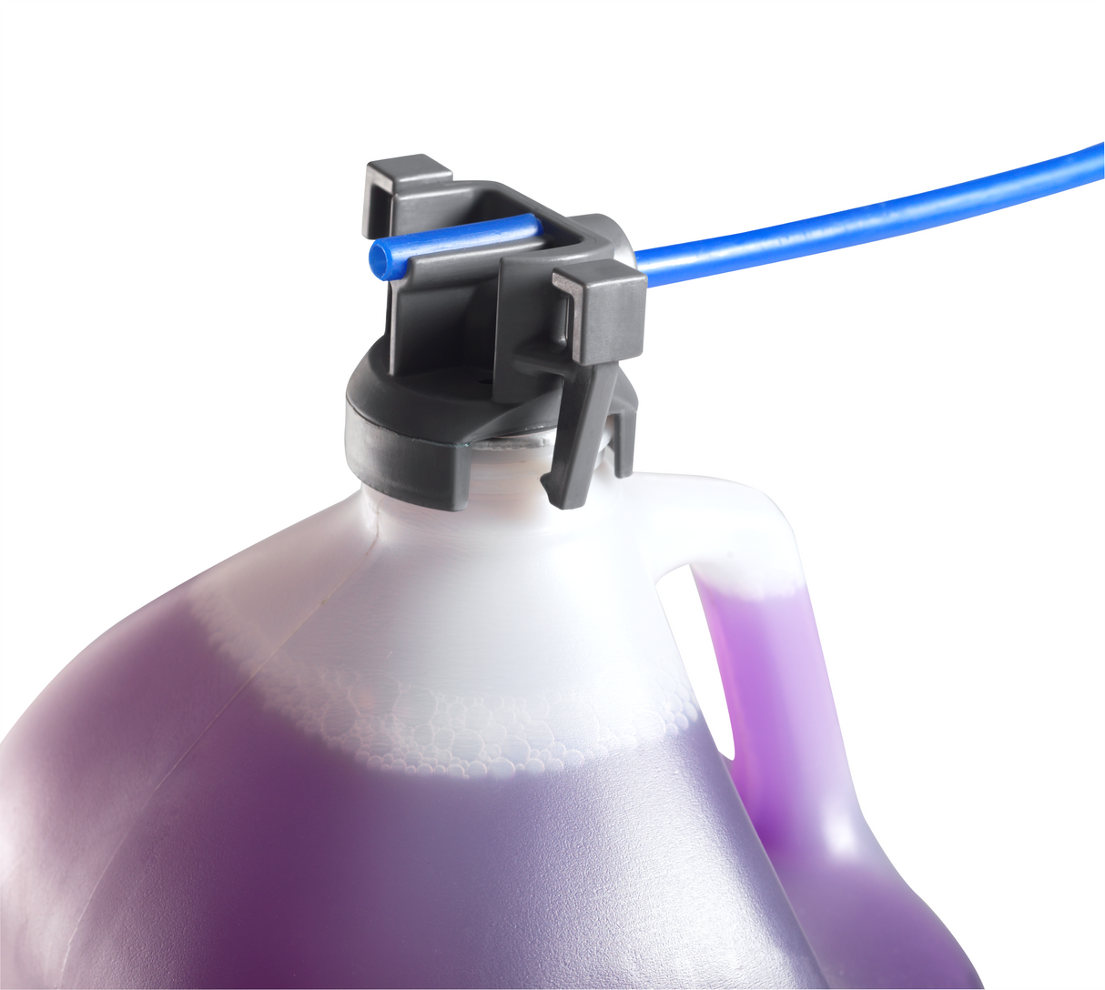 A close-up of a translucent plastic jug with a handle, filled with purple liquid—commonly used in glasswasher or undercounter dishwasher systems. The black cap is fitted with a blue tube and gray connector for easy dispensing. The background is white.