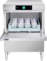 A commercial undercounter dishwasher with a front-open door displays a tray of neatly organized white cups inside. The stainless steel, energy efficient machine features a digital control panel and green power button, set in a clean, industrial environment.
