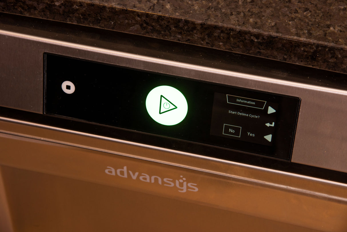 A close-up of an Advansys undercounter dishwasher control panel shows a glowing green triangle start button and display screen with cycle options. The stainless steel surface and granite countertop highlight its high temperature sanitizing capabilities.