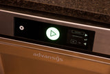 A close-up of an Advansys undercounter dishwasher control panel shows a glowing green triangle start button and display screen with cycle options. The stainless steel surface and granite countertop highlight its high temperature sanitizing capabilities.