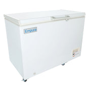 A large, white Empura solid lid freezer with a flat lid is shown on four wheels. The Empura logo is on the front, and there is a small control panel with buttons and indicator lights at the bottom right corner. Simple, clean design.