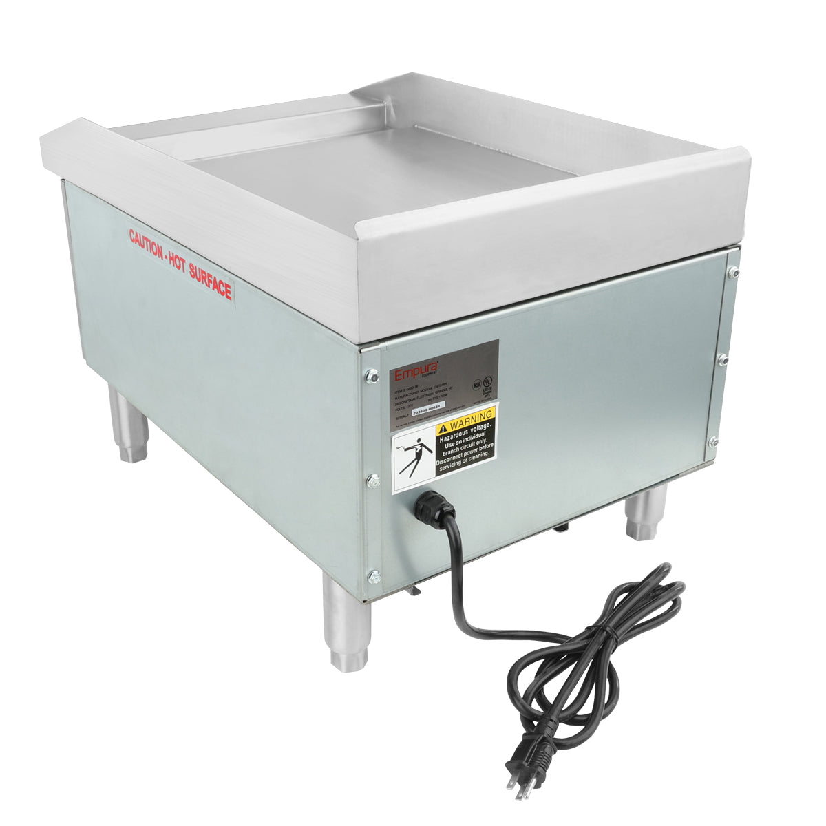 A commercial electric countertop griddle with a flat griddle surface, raised edges, stainless steel construction, caution label, power cord, and sturdy legs. The side panel displays safety warnings and “Caution: Hot Surface” in red.