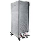 A silver, full size heating holding cabinet with a transparent door, metal wire rack slots for up to 36 pan capacity inside, control knobs and indicator lights at the bottom. The unit is on four black caster wheels and labeled “Empura” on the front.