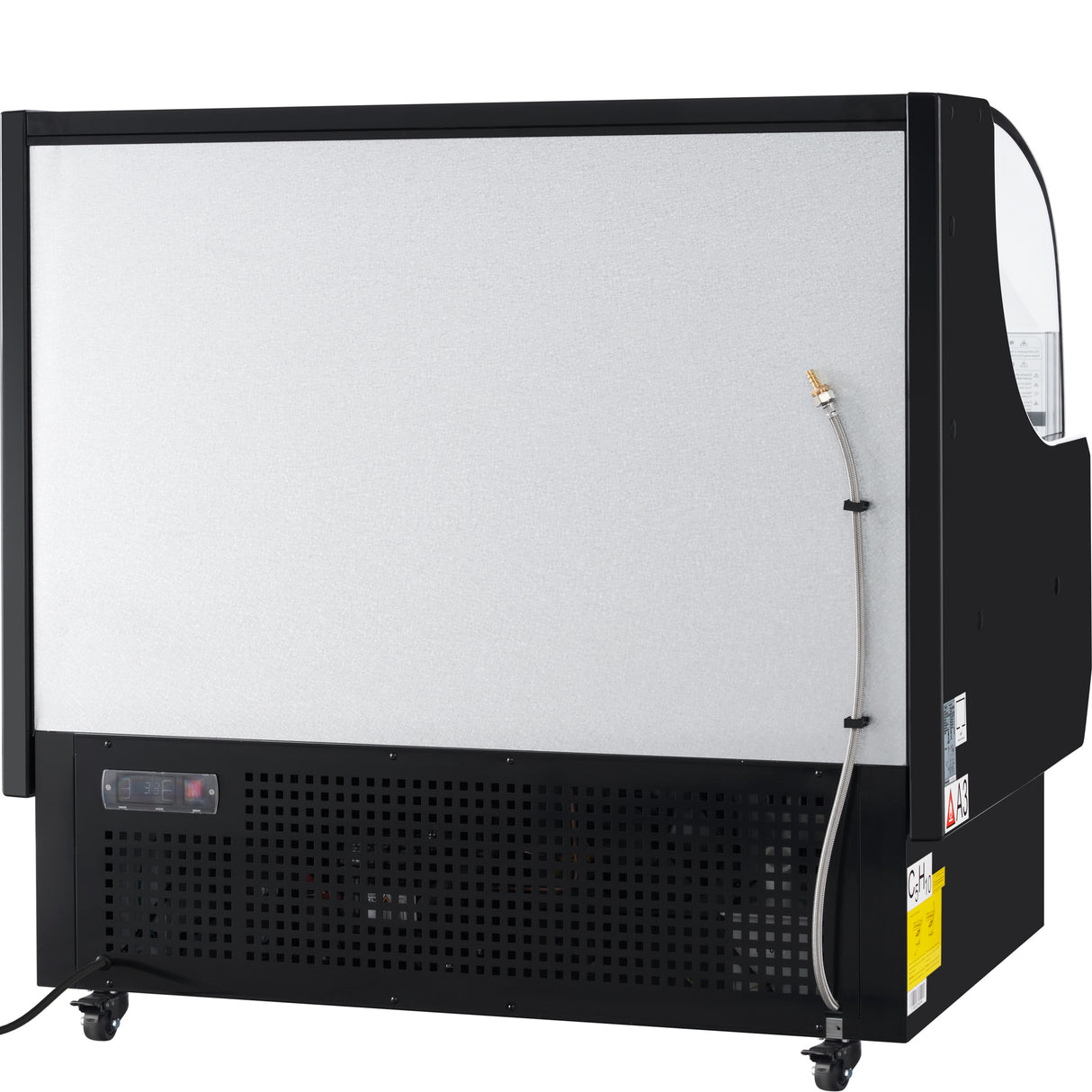 A large Empura refrigeration ice machine with a black frame and silver front panel stands on wheels. A hose is attached to the right side. Vents, a control panel, and warning labels are visible on the lower front section. Plain white background.