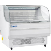 A white Empura refrigeration open air merchandiser with a curved glass front, open shelving, LED top lighting, a vented lower section, and casters for mobility. The interior is empty and clean, ready for displaying food items.