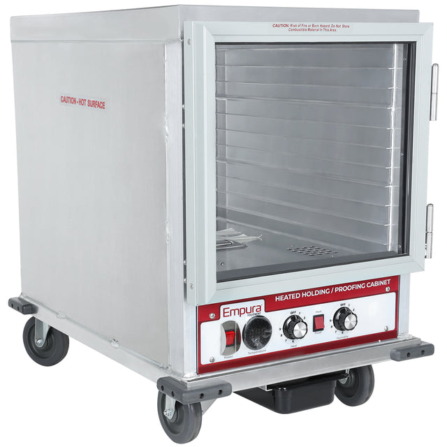 A stainless steel Empura E-HPI1812 Proofers and Heated Cabinet on wheels with an open glass door, 12 pan capacity, multiple tray slots, and a control panel with knobs and switches labeled “Empura” at the bottom front.