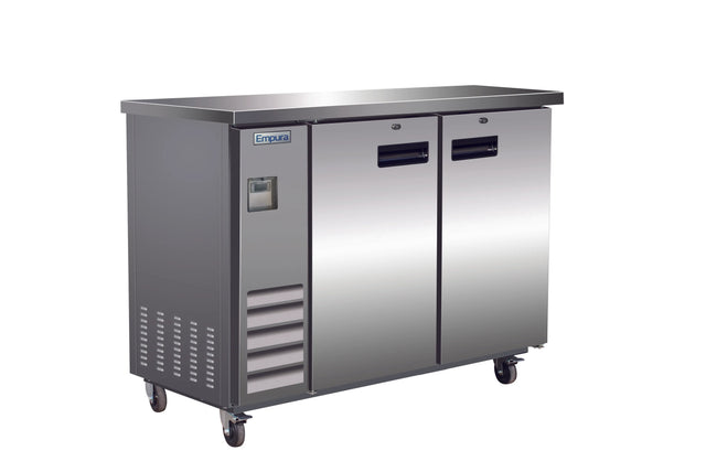 The Empura Refrigeration stainless steel commercial refrigerator features two doors, ventilation slots on the lower left, a digital display, and stands on four wheels for mobility. The flat countertop surface makes it ideal as a back bar cooler in busy settings.