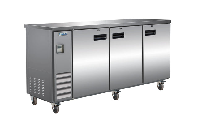 A commercial Empura Refrigeration stainless steel refrigerator with three doors, mounted on four caster wheels. The reflective surface features ventilation grilles on the left, black handles on each door, and an “Empura” brand label at the top left.