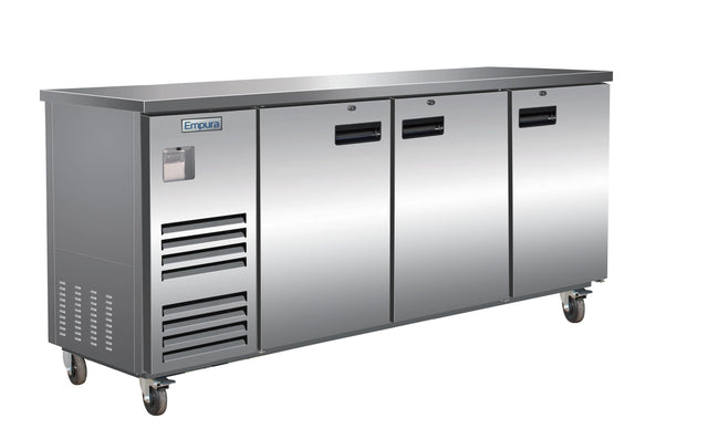 A commercial stainless steel worktop refrigerator with three front doors on wheels, ventilation slats on the left, a digital display, and the Empura logo. This sleek unit blends modern design with robust commercial refrigeration performance.