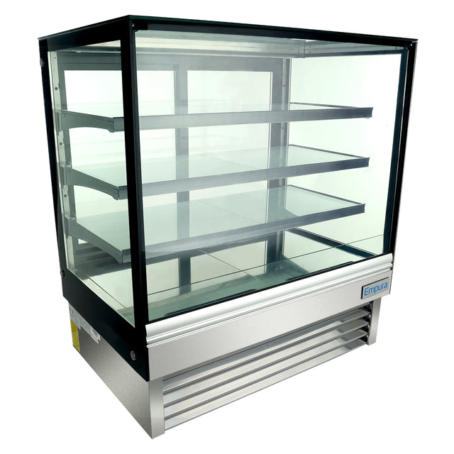 A refrigerated display case with a stainless steel base, three adjustable glass shelves, and LED lighting. Clear glass panels on all sides are framed in black, and the bottom features a vented grill for refrigeration. The interior is empty.